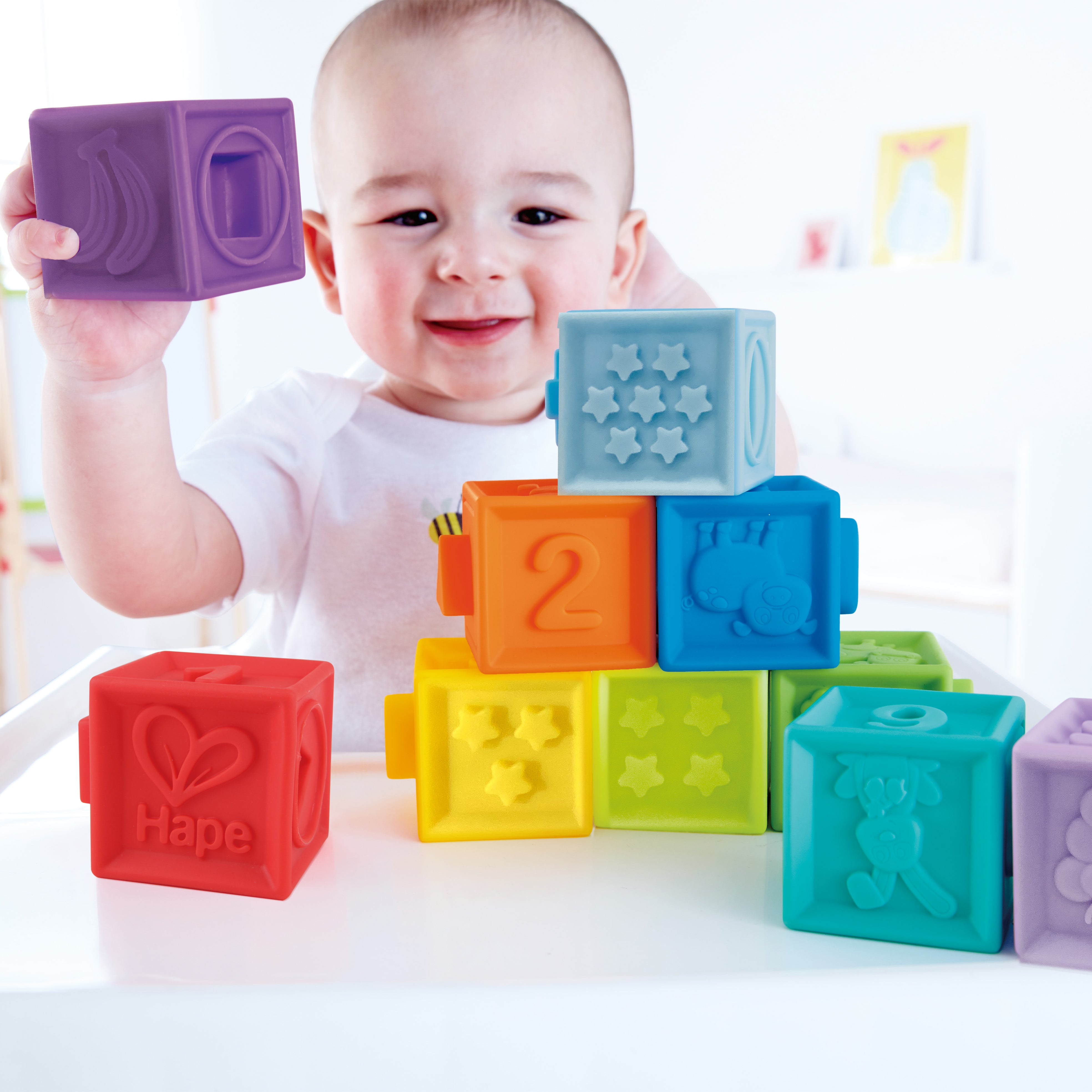 Hape Squeeze Me Blocks Soft Silicone Stacking Toy 10pcs – Colorful Textured Blocks for Teething, Stacking, and Early Learning