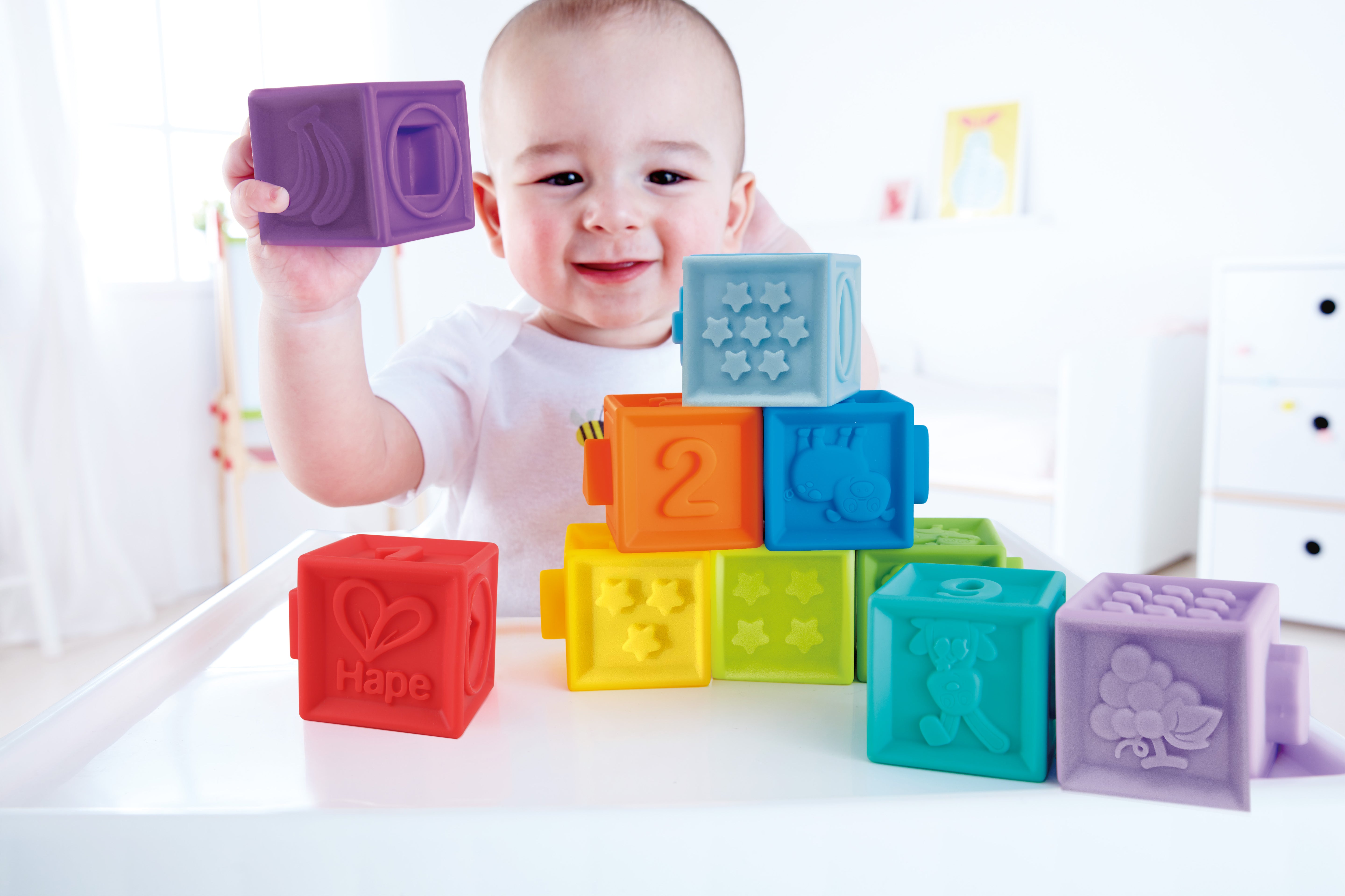 Hape Squeeze Me Blocks Soft Silicone Stacking Toy 10pcs – Colorful Textured Blocks for Teething, Stacking, and Early Learning