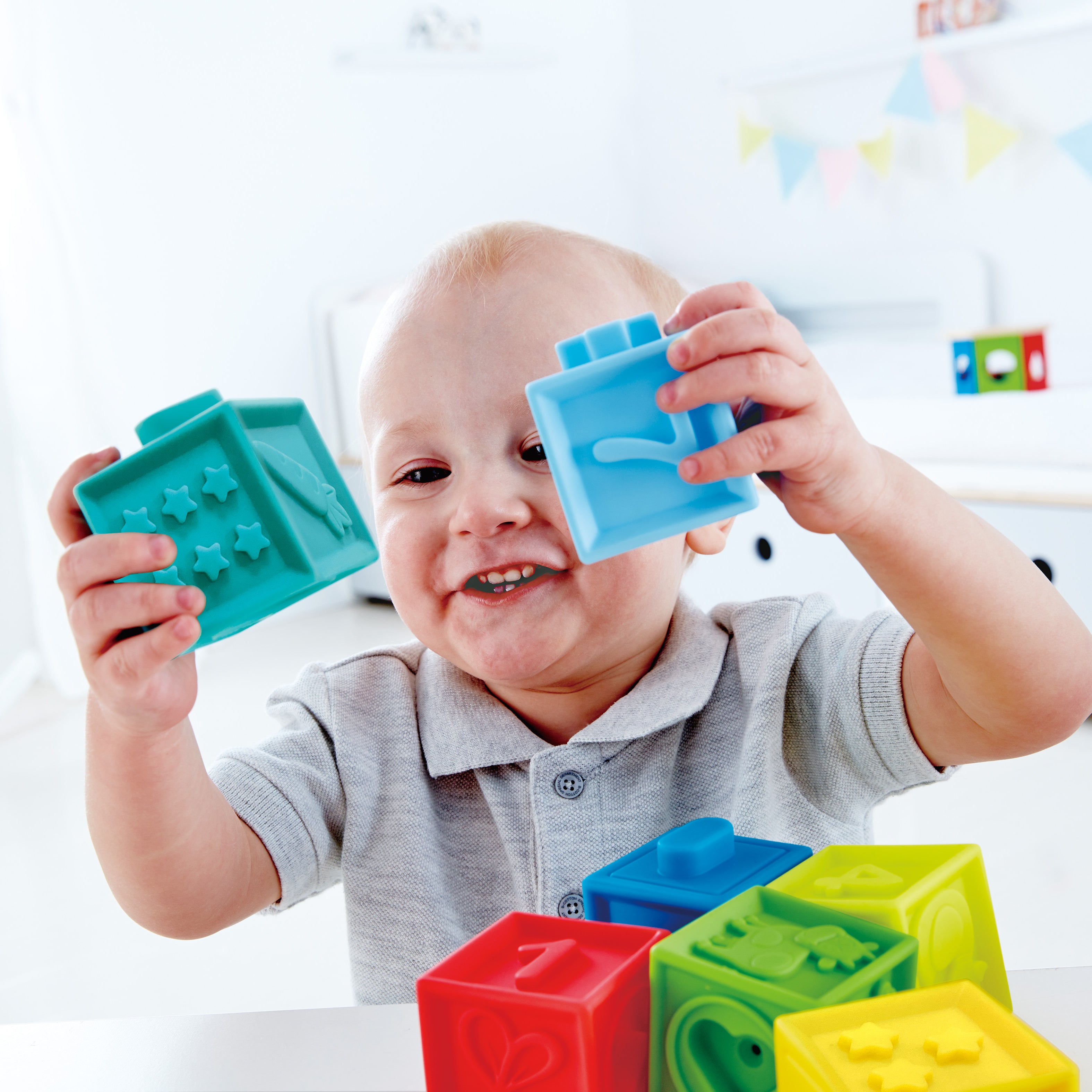 Hape Squeeze Me Blocks Soft Silicone Stacking Toy 10pcs – Colorful Textured Blocks for Teething, Stacking, and Early Learning