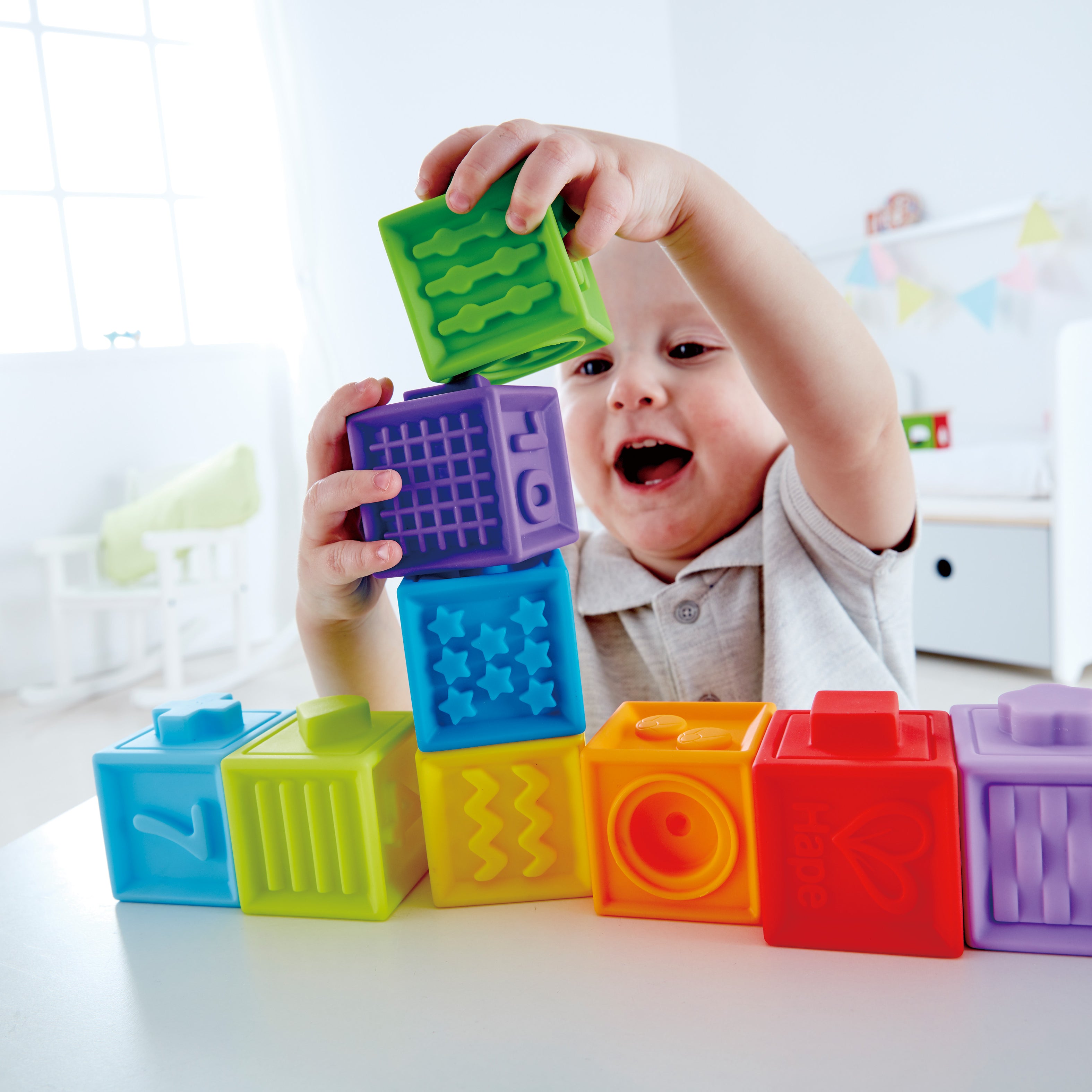 Hape Squeeze Me Blocks Soft Silicone Stacking Toy 10pcs – Colorful Textured Blocks for Teething, Stacking, and Early Learning