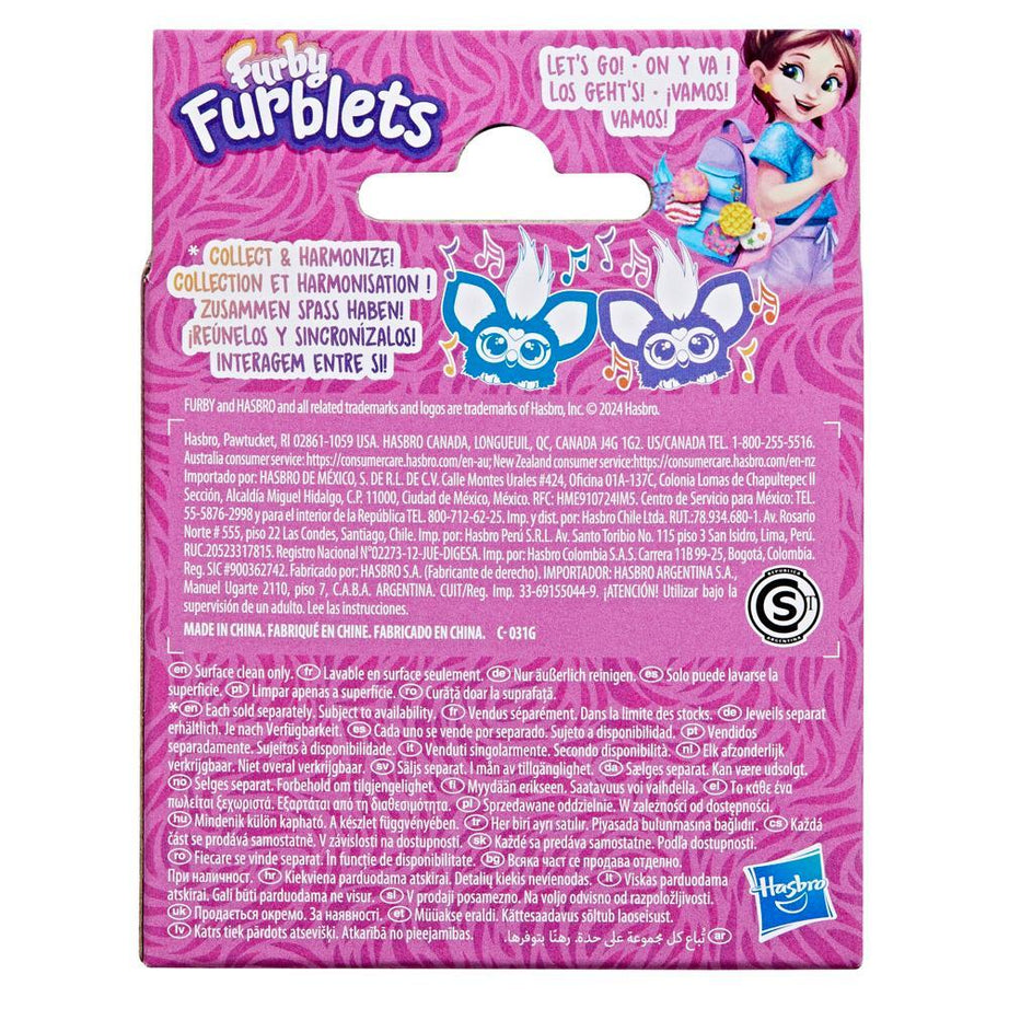 Back of a Furby Furblets packaging with pink background and character illustration.