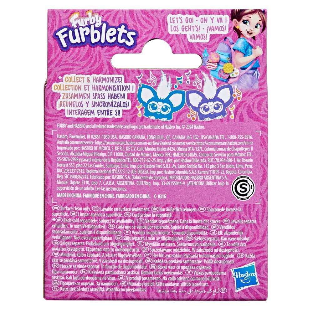Back of a Furby Furblets packaging with pink background and character illustration.