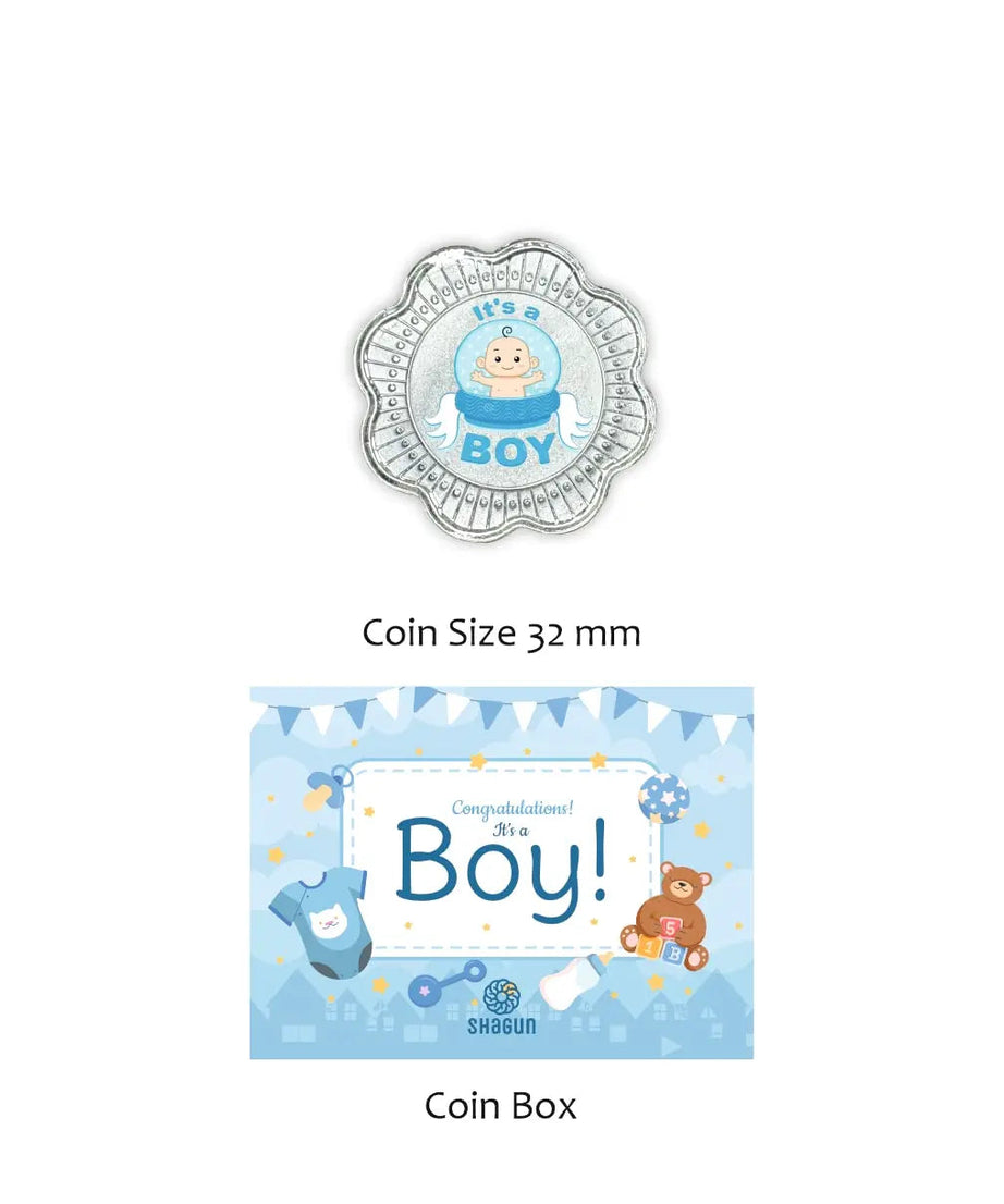Shagun Coins baby boy coin and matching coin box set. The top item is a silver scalloped coin featuring a cartoon baby in a blue snow globe with the text 'it's a BOY'.