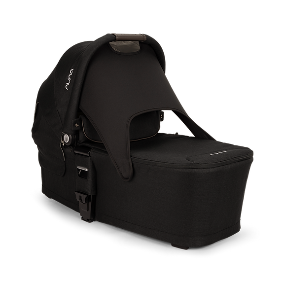 Nuna Lytl Carry Cot - Caviar | Compact Comfort for Your Newborn