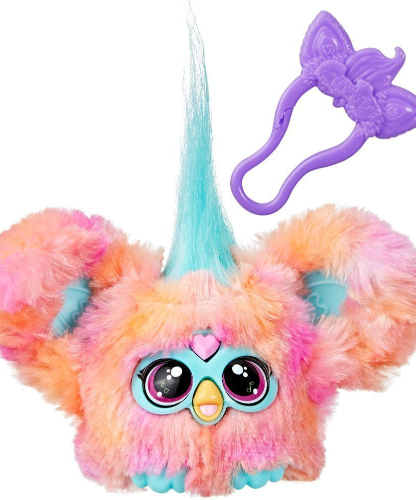 Colorful fluffy toy with a purple hair clip on a white background