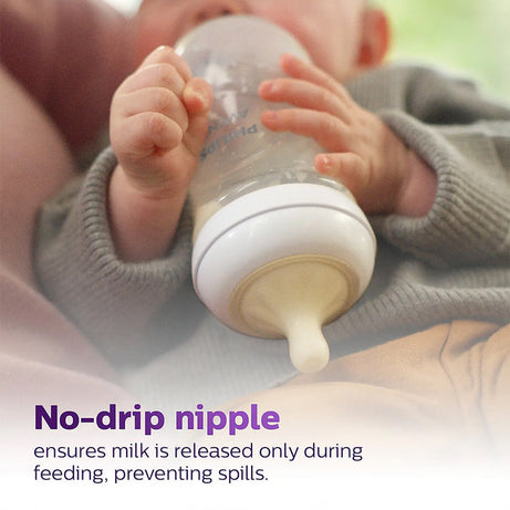 Philips Avent Natural Response Feeding Bottle - Anti-Colic - 125 ml | Flow 2 Nipple - Transparent - 0M+