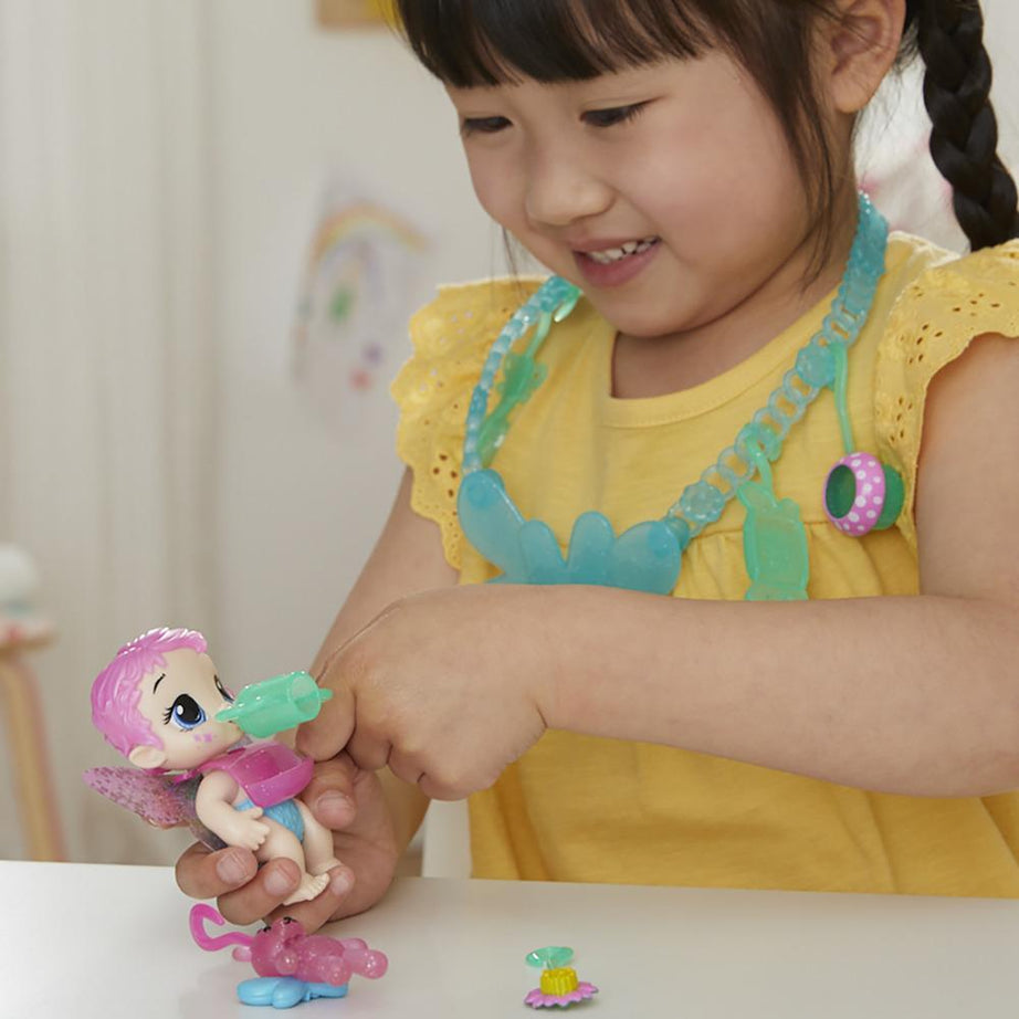 Hasbro Baby Alive Glo Pixies Minis Carry ‘n Care Necklace - Sugar Sprinkle Pixie Doll, 3.75-Inch Toy with Charm Necklace & Doll Carrier for Kids Ages 3+