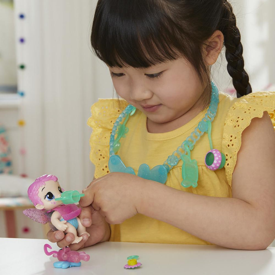 Hasbro Baby Alive Glo Pixies Minis Carry ‘n Care Necklace - Sugar Sprinkle Pixie Doll, 3.75-Inch Toy with Charm Necklace & Doll Carrier for Kids Ages 3+