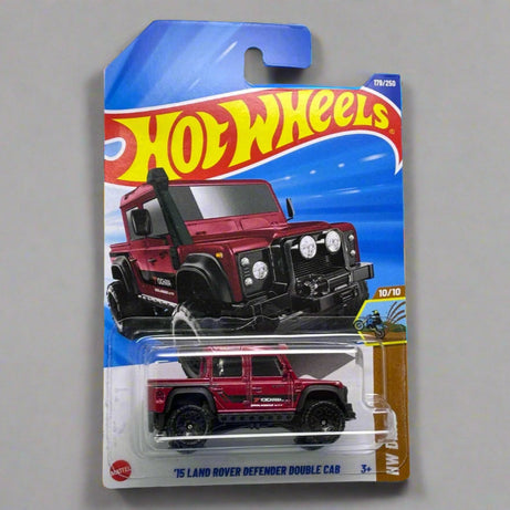Hot Wheels '15 Land Rover Defender Double Car' packaging on a gray background