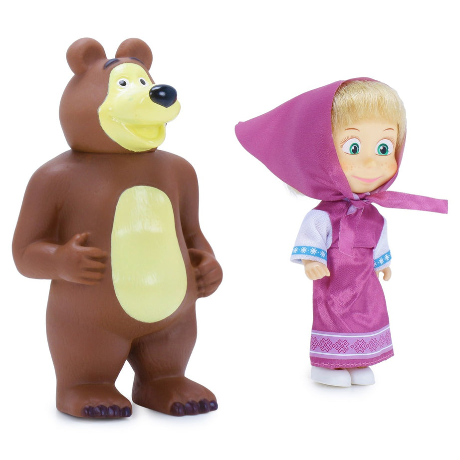 Toy bear and doll with pink hood on a white background