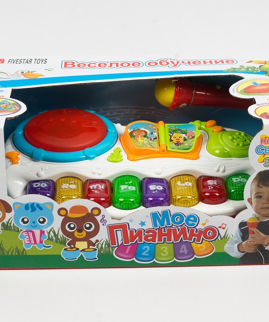 Colorful toy set with educational elements in a box on a white background