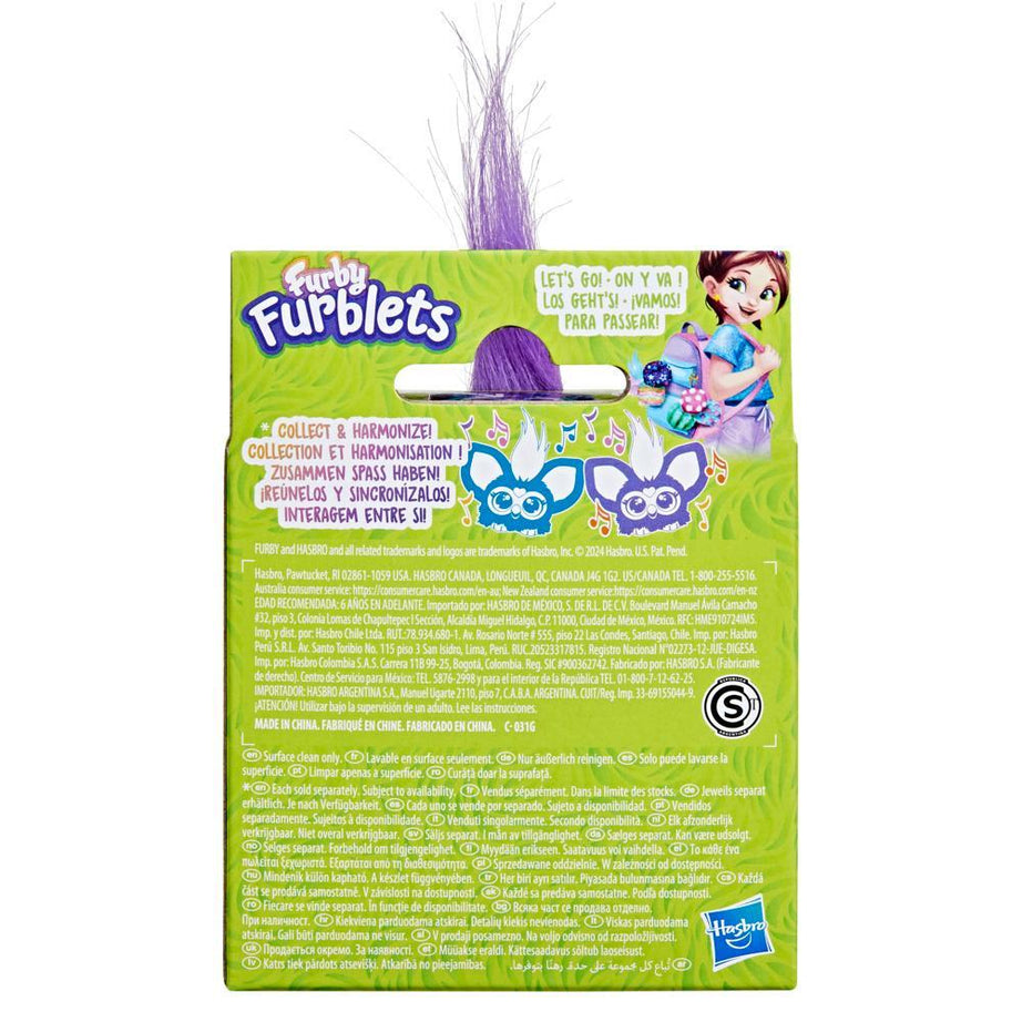 Furby Furblets toy packaging with purple hair on a white background