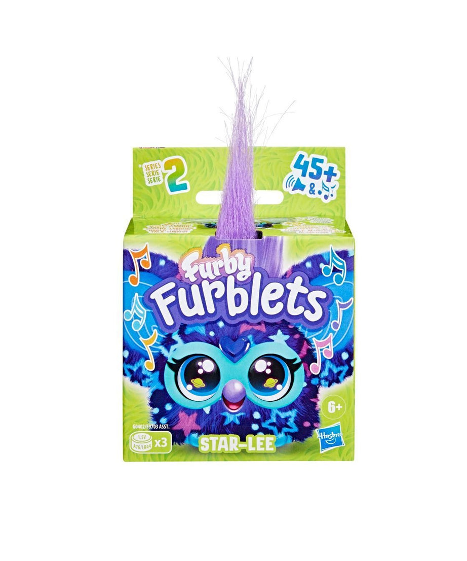 Furry Furblets toy packaging with a purple-haired character on a white background