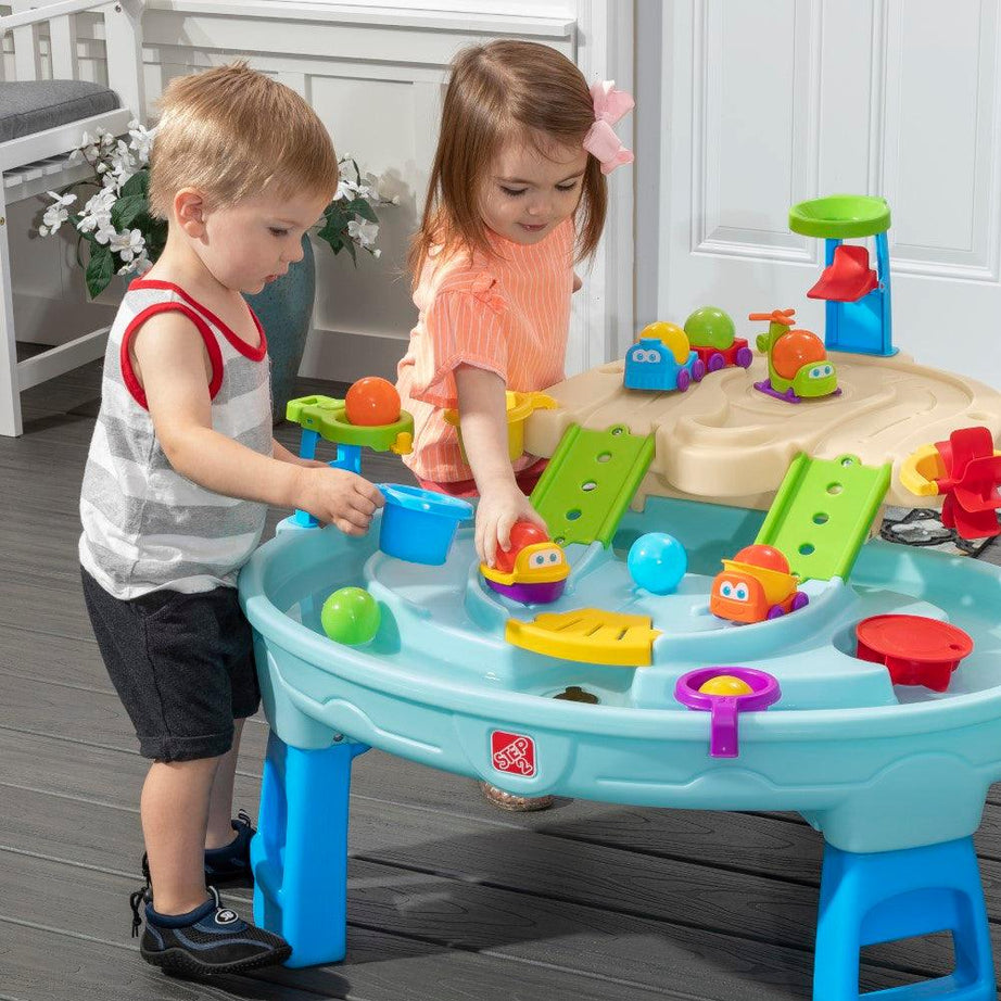 Step2 Ball Buddies Adventure Center Water Table - Two-Tier Water Play Table with Dump Truck, Train, Boat & Helicopter Toys | 22-Piece Accessory Set | For Toddlers 2+ Years | Outdoor Sensory STEM Activity Table