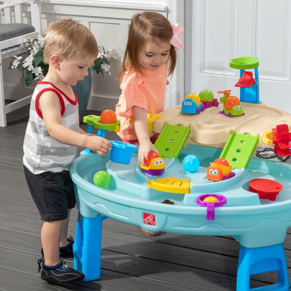Step2 Ball Buddies Adventure Center Water Table - Two-Tier Water Play Table with Dump Truck, Train, Boat & Helicopter Toys | 22-Piece Accessory Set | For Toddlers 2+ Years | Outdoor Sensory STEM Activity Table