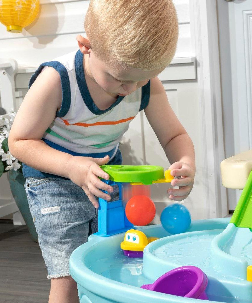 Step2 Ball Buddies Adventure Center Water Table - Two-Tier Water Play Table with Dump Truck, Train, Boat & Helicopter Toys | 22-Piece Accessory Set | For Toddlers 2+ Years | Outdoor Sensory STEM Activity Table - MINIMEE KIDS