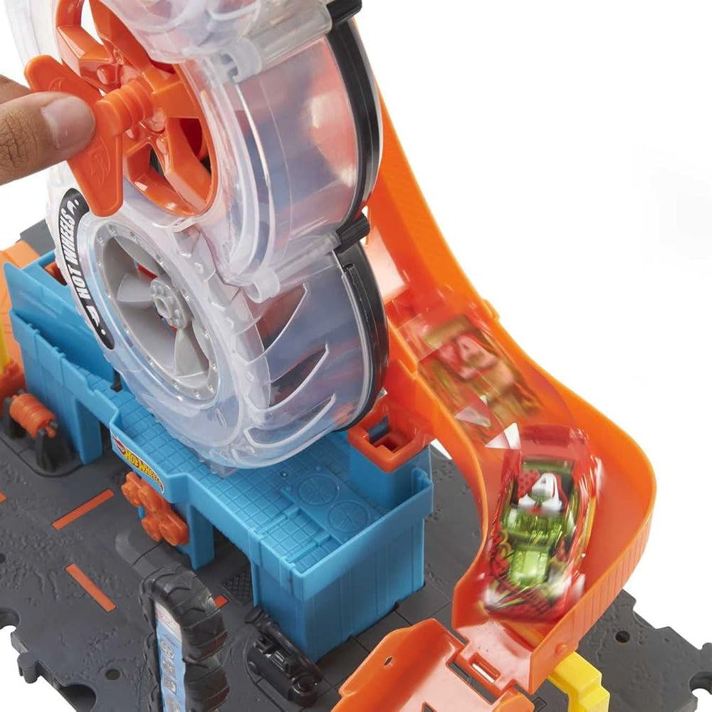 Hot Wheels City Super Twist Tire Shop Playset with Stunt Launcher & 1 Hot Wheels Car – Interactive Car Service Station for Kids 4+
